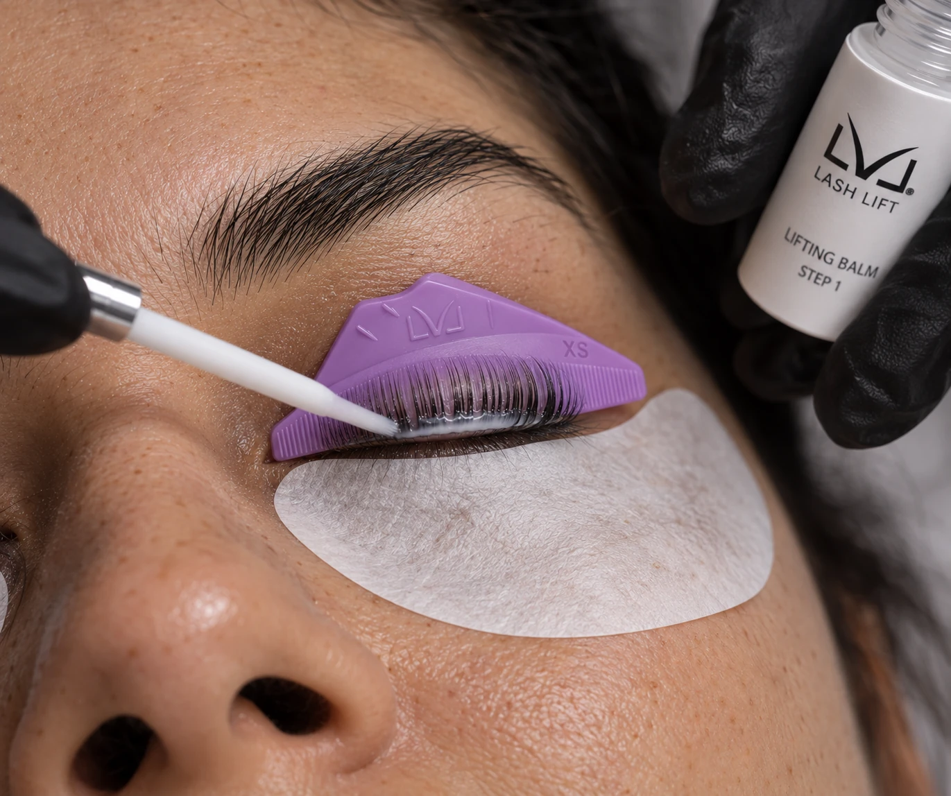 Close-up of a lash lift with lashes positioned on a silicone shield